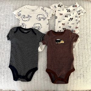 Set of four baby onesies by Carter’s size 3 months